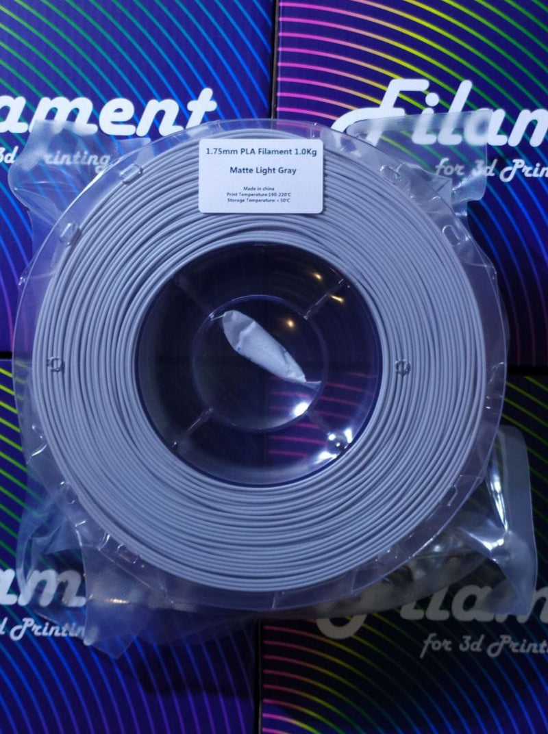 Load image into Gallery viewer, Открийте вълшебството на Nature3D 1.75mm 1kg PLA филамент в цвят "Матов светло сив". Този материал е идеален за всички видове приложения, от прототипиране до производство на функционални предмети.